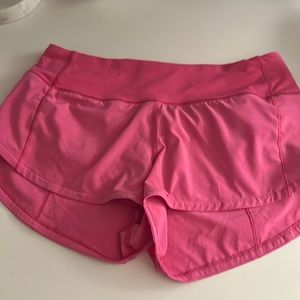 Lululemon size 2 speed up shorts in sonic pink. Low rise 2.5 in.